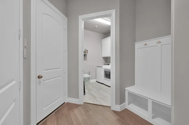 a room with gym equipment and a large window