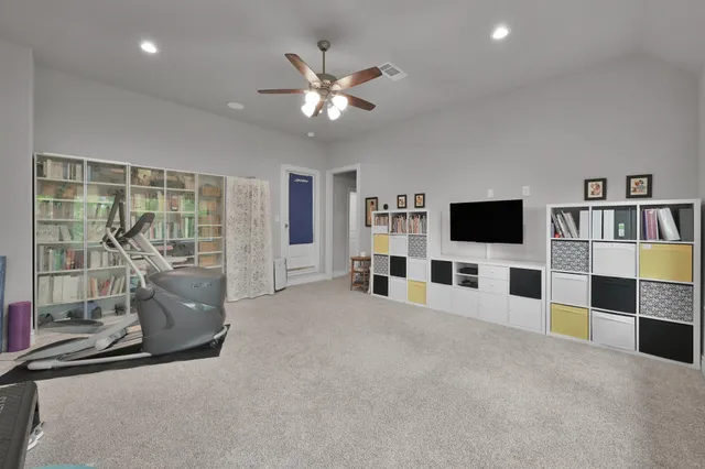 a bathroom with a sink toilet and mirror