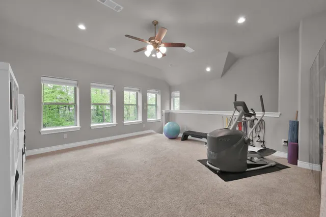 a bed room with a bed and a window