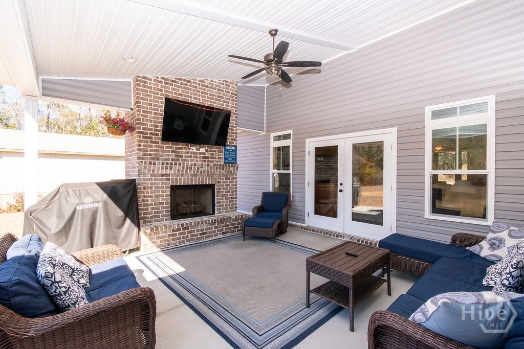 1355 Old Louisville Road Guyton, GA 31312 - Photo 37 of 43 Covered Patio- Brick, Gas Fireplace