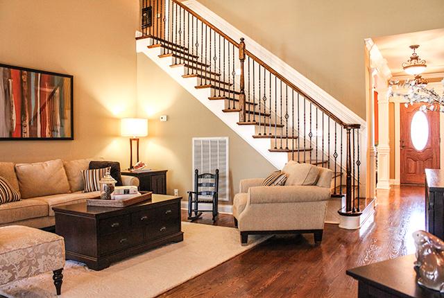 5336 Sherrington Road Murfreesboro, TN 37128 - Photo 3 of 20 Iron spindle staircase and hardwood floors.