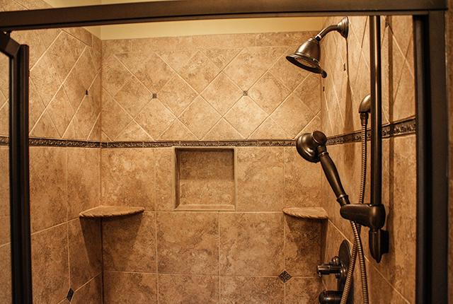 5336 Sherrington Road Murfreesboro, TN 37128 - Photo 8 of 20 Decorative tiled shower with upgraded body-spray and shower head.