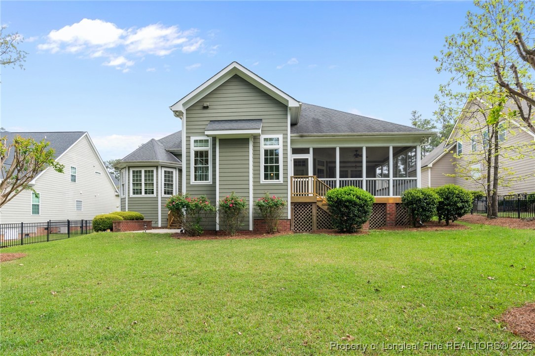 30 Spring Pond Lane Spring Lake, NC 28390 - Photo 5 of 35 a view of a house with a yard and potted plants