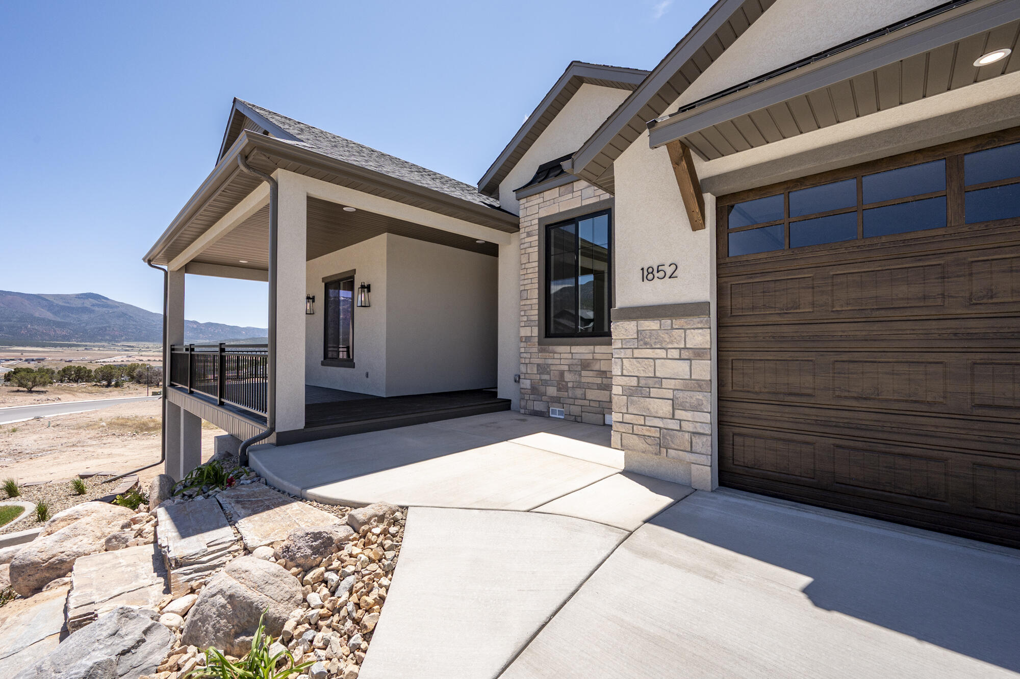 1852 South Hidden Canyon Road Cedar City, UT 84720 - Photo 5 of 79 The home makes a lasting first impression, with quality construction and refined details evident from the exterior.