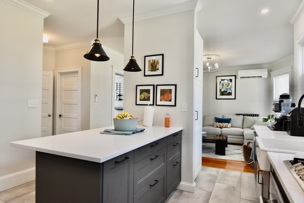 14 Castlerock Street, Unit 14 Boston, MA 02125 - Photo 13 of 32 a view of living room with furniture and window