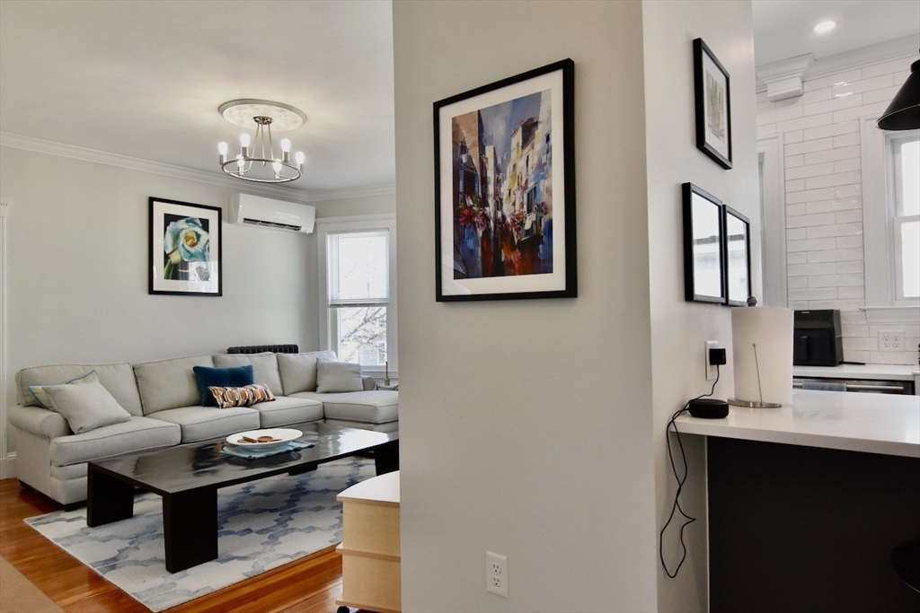 14 Castlerock Street, Unit 14 Boston, MA 02125 - Photo 17 of 32 a living room with furniture