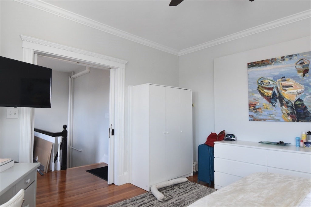 14 Castlerock Street, Unit 14 Boston, MA 02125 - Photo 20 of 32 a view of room with furniture and wooden floor