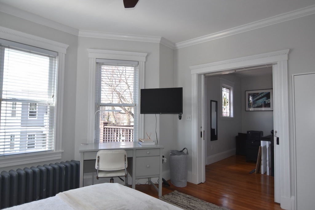 14 Castlerock Street, Unit 14 Boston, MA 02125 - Photo 21 of 32 a view of a livingroom with a window