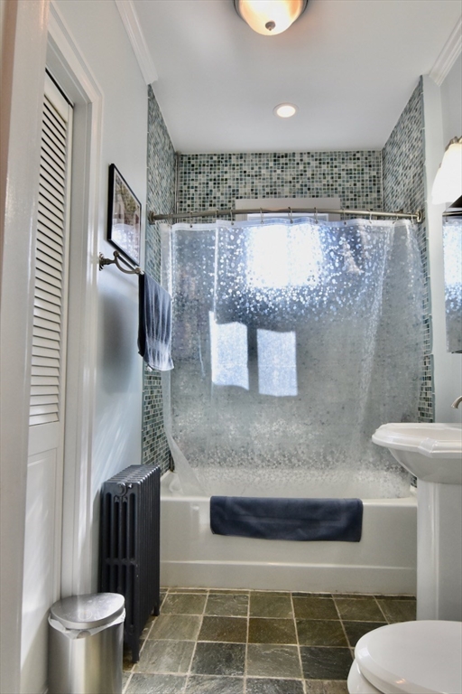 14 Castlerock Street, Unit 14 Boston, MA 02125 - Photo 28 of 32 a bathroom with a toilet and a sink