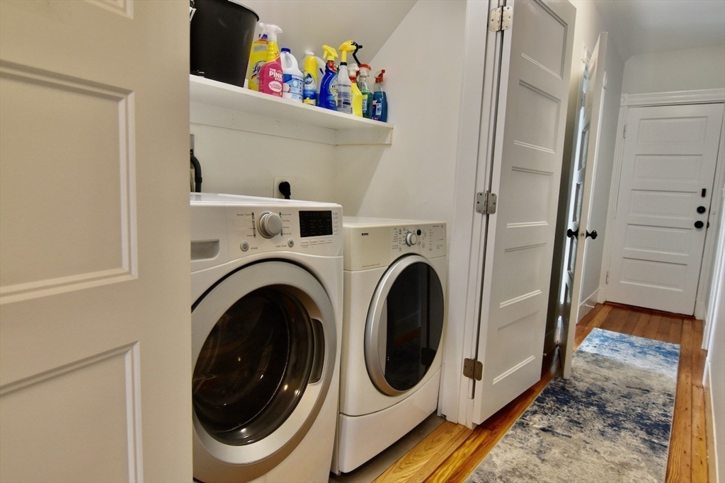 14 Castlerock Street, Unit 14 Boston, MA 02125 - Photo 31 of 32 a utility room with dryer and washer