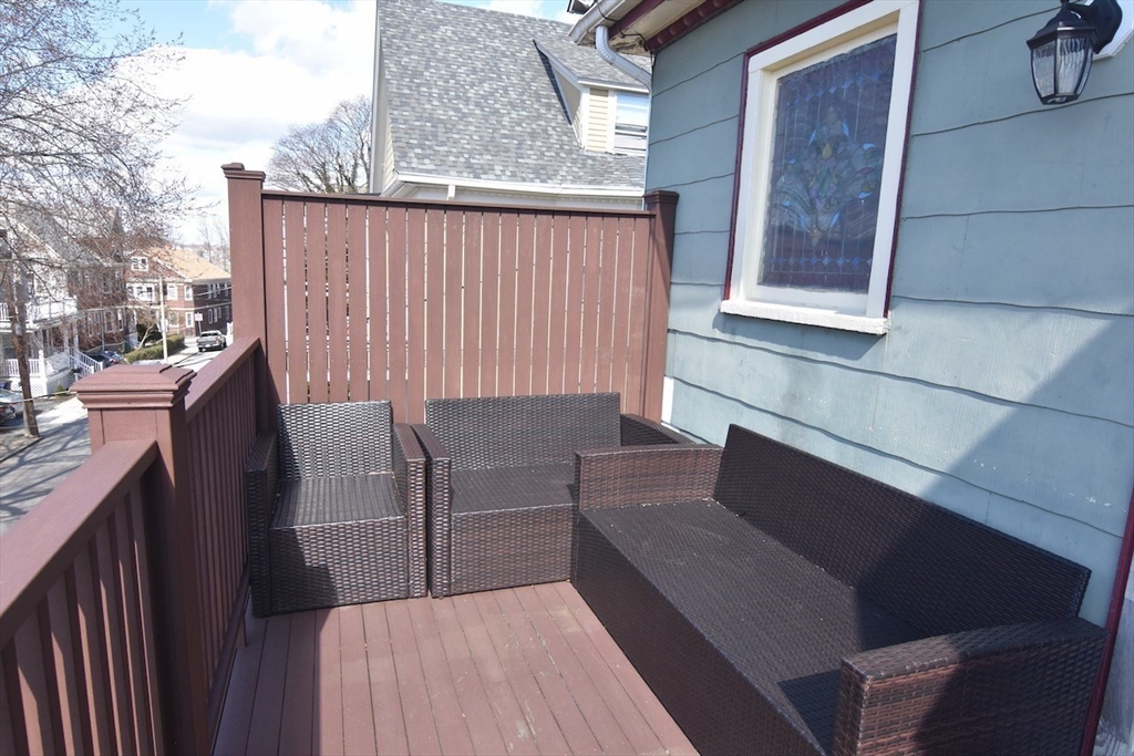 14 Castlerock Street, Unit 14 Boston, MA 02125 - Photo 5 of 32 a view of outdoor kitchen outdoor seating and kitchen