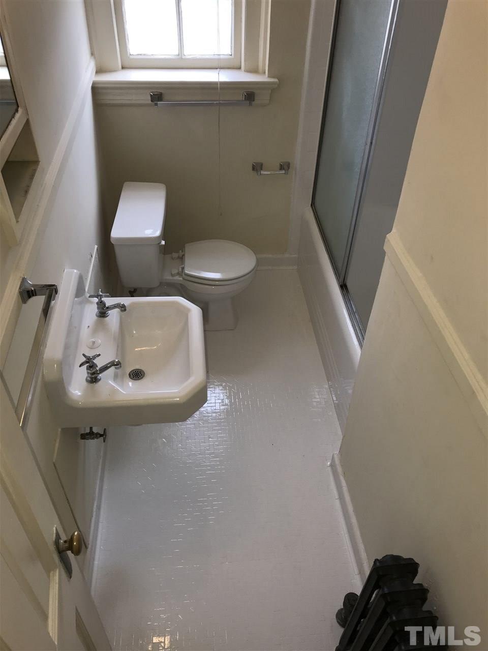 2402 Clark Avenue, Unit 10 Raleigh, NC 27607 - Photo 9 of 19 a bathroom with a sink and toilet