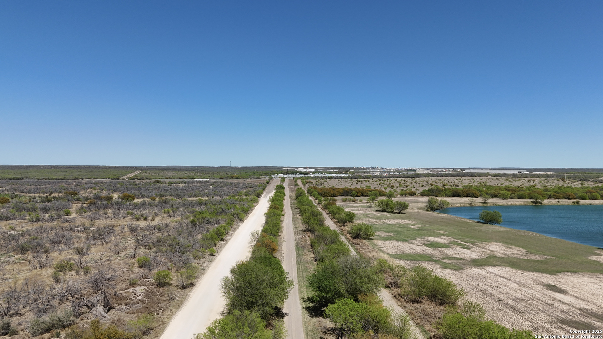 0 Mines Road Laredo, TX 78045 - Photo 21 of 40 a view of a lake with houses in the back