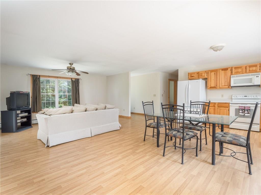3 Grandview Road Bethel, ME 04217 - Photo 9 of 26 The dining area is open to the...