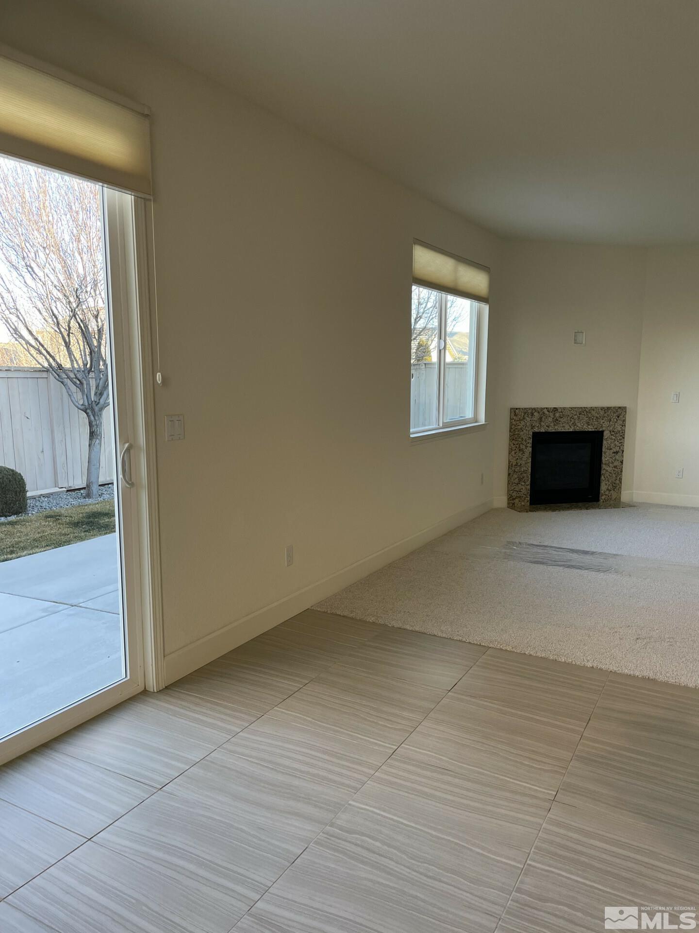 2087 Whitecliff Drive Reno, NV 89521 - Photo 12 of 33 a view of an empty room with a window