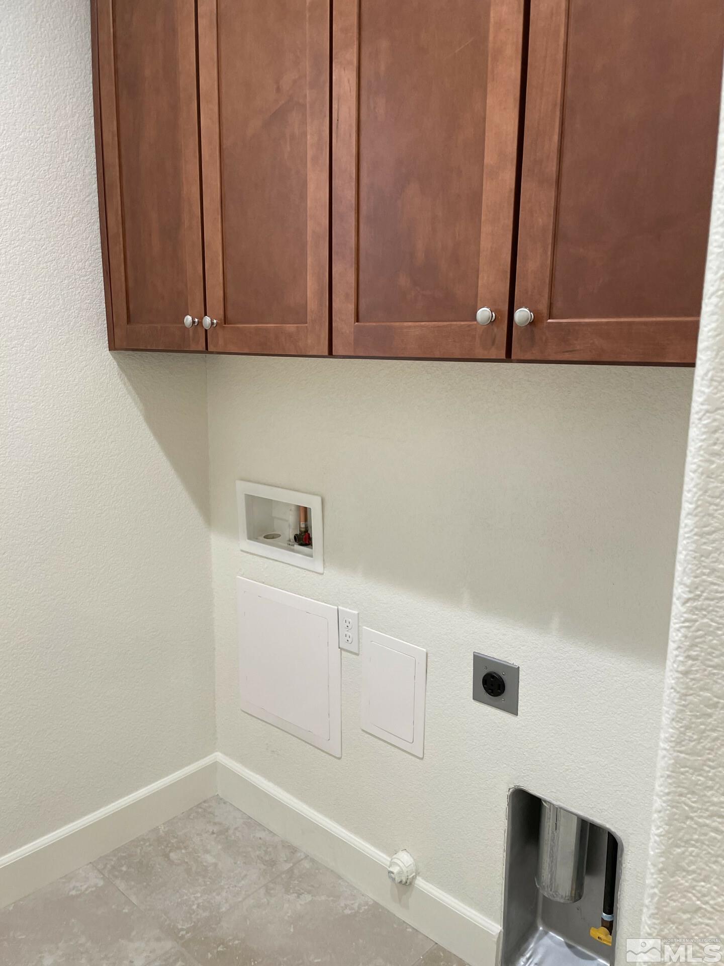 2087 Whitecliff Drive Reno, NV 89521 - Photo 25 of 33 a view of cabinets and wooden floor