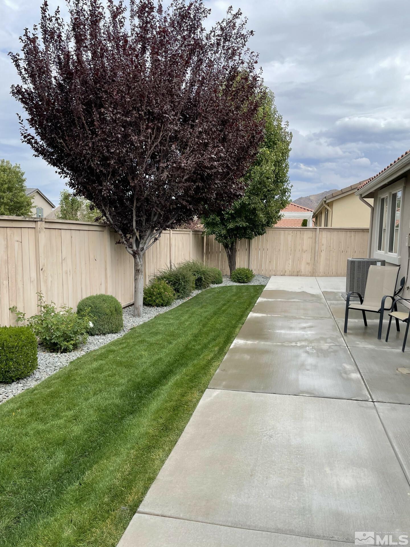 2087 Whitecliff Drive Reno, NV 89521 - Photo 32 of 33 a front view of house with yard and green space
