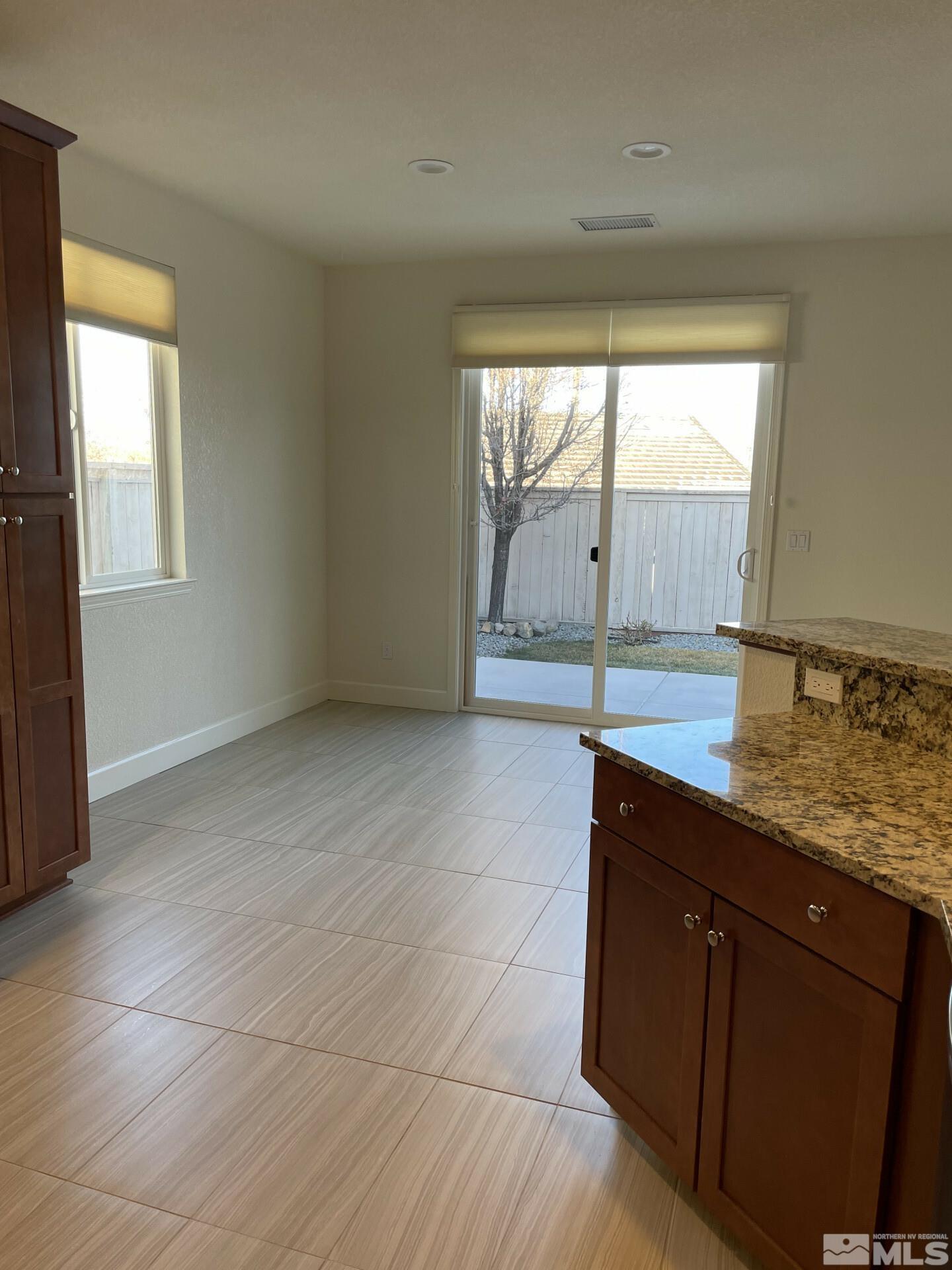 2087 Whitecliff Drive Reno, NV 89521 - Photo 10 of 33 a view of an empty room with a window
