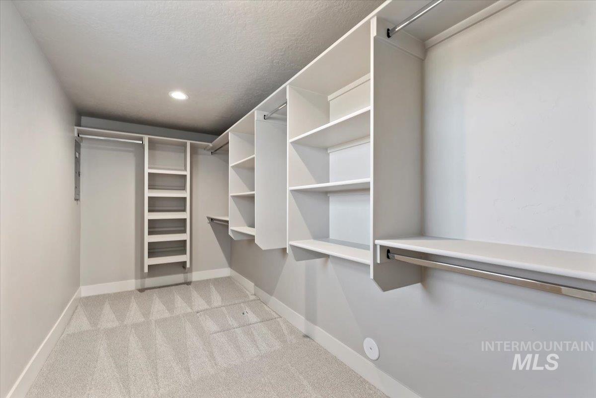 2435 North Black Cat Road Meridian, ID 83646 - Photo 15 of 32 Walk in closet with light carpet