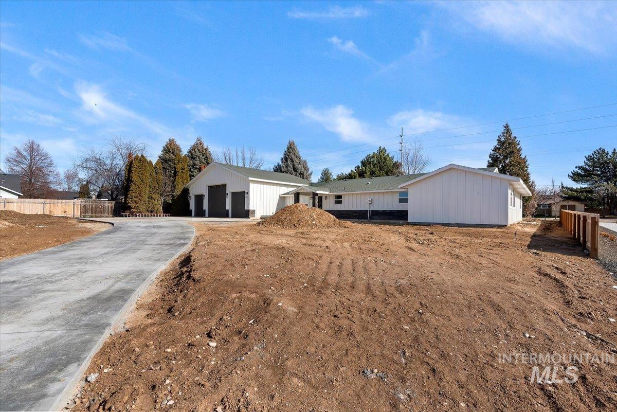 2435 North Black Cat Road Meridian, ID 83646 - Photo 3 of 32 View of front of house with asphalt driveway