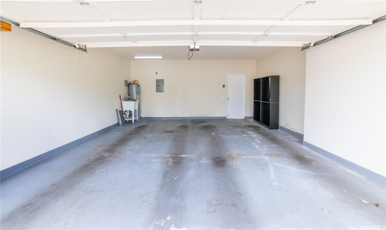 91-945 Laaulu Street, Unit 44B Ewa Beach, HI 96706 - Photo 20 of 25 2 car Garage