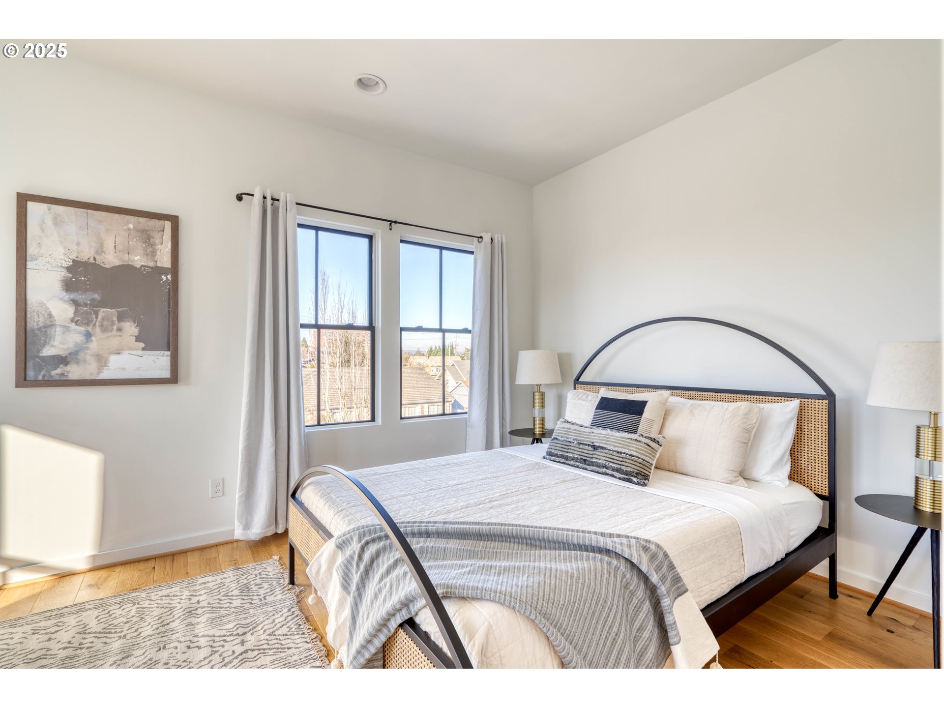 508 Northeast 56th Avenue Portland, OR 97213 - Photo 25 of 38 a bedroom with a bed and a painting on the wall