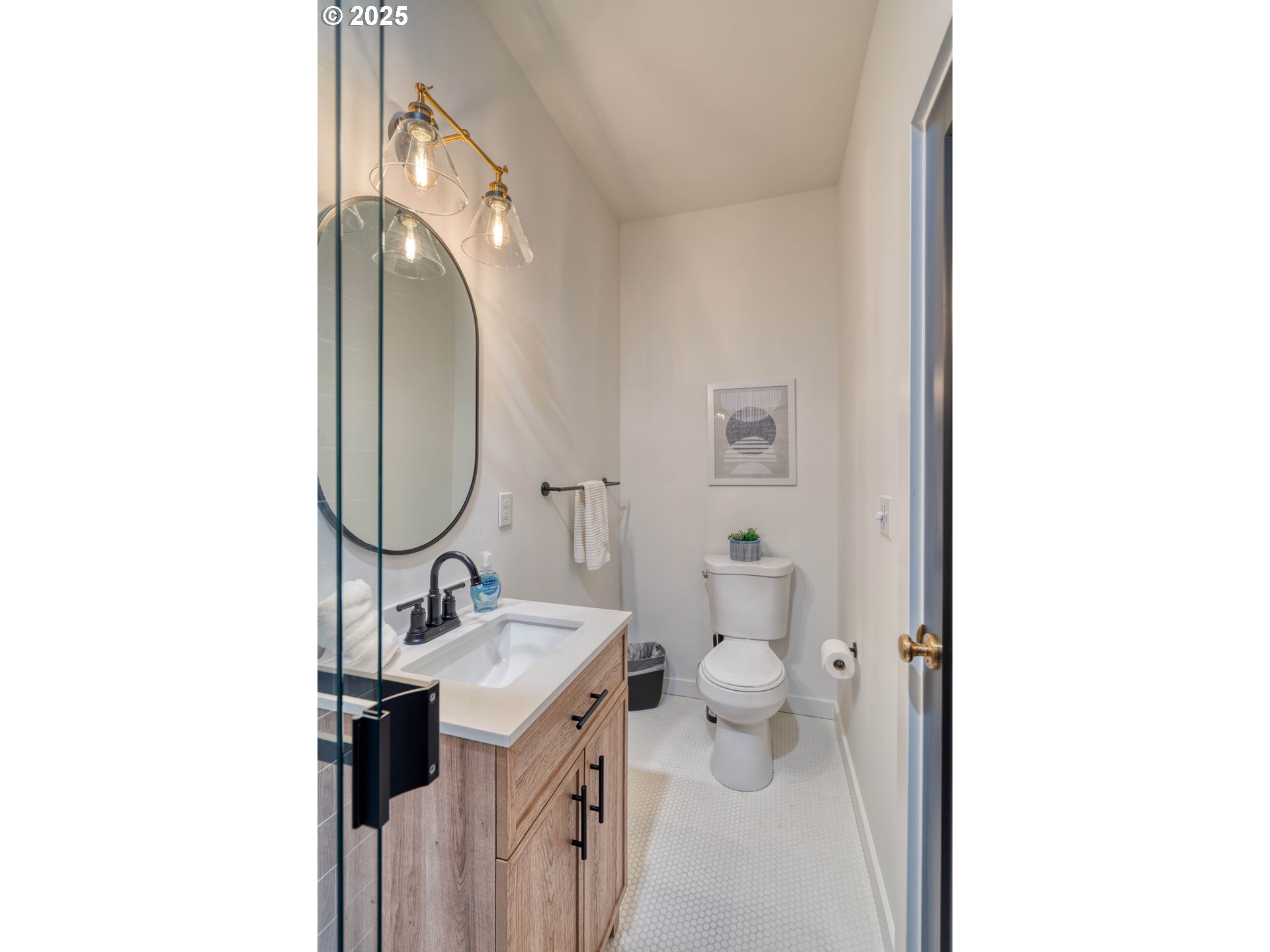 508 Northeast 56th Avenue Portland, OR 97213 - Photo 28 of 38 a bathroom with a sink a toilet and a mirror