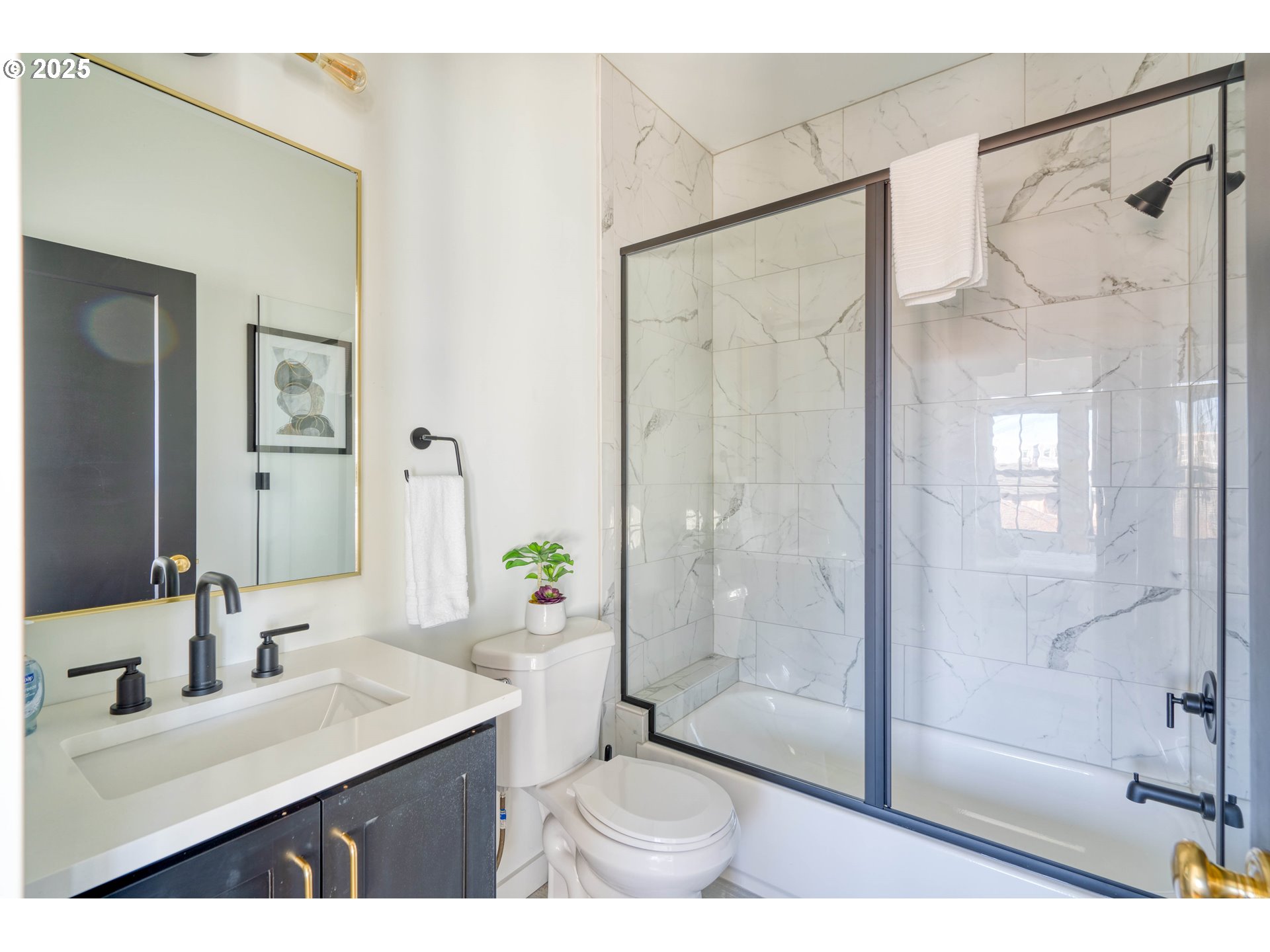 508 Northeast 56th Avenue Portland, OR 97213 - Photo 33 of 38 a bathroom with a sink and a mirror with bathtub