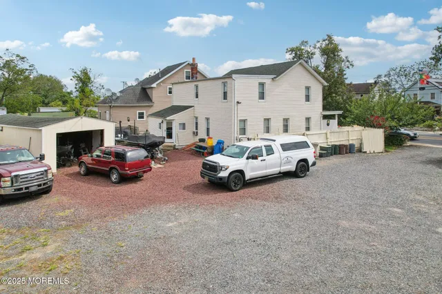 an aerial view of a house with a garden