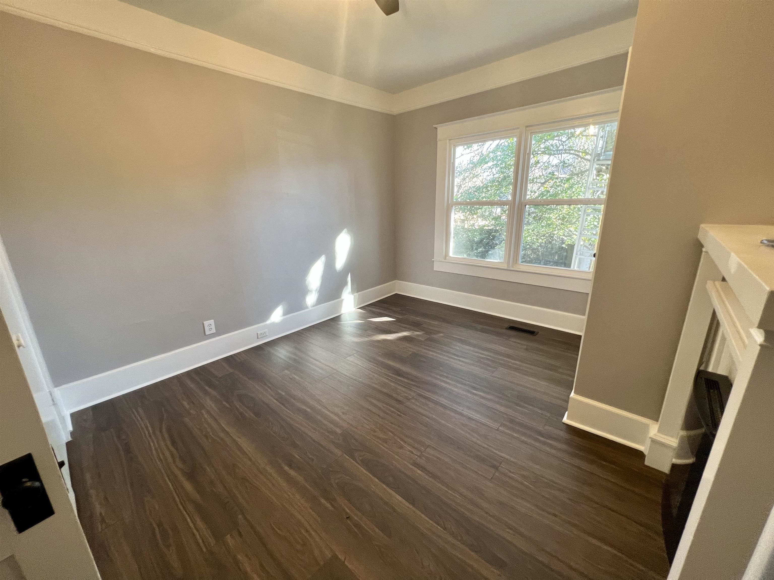 129 Wardlaw Circle Ripley, TN 38063 - Photo 14 of 24 a view of empty room with wooden floor and fan