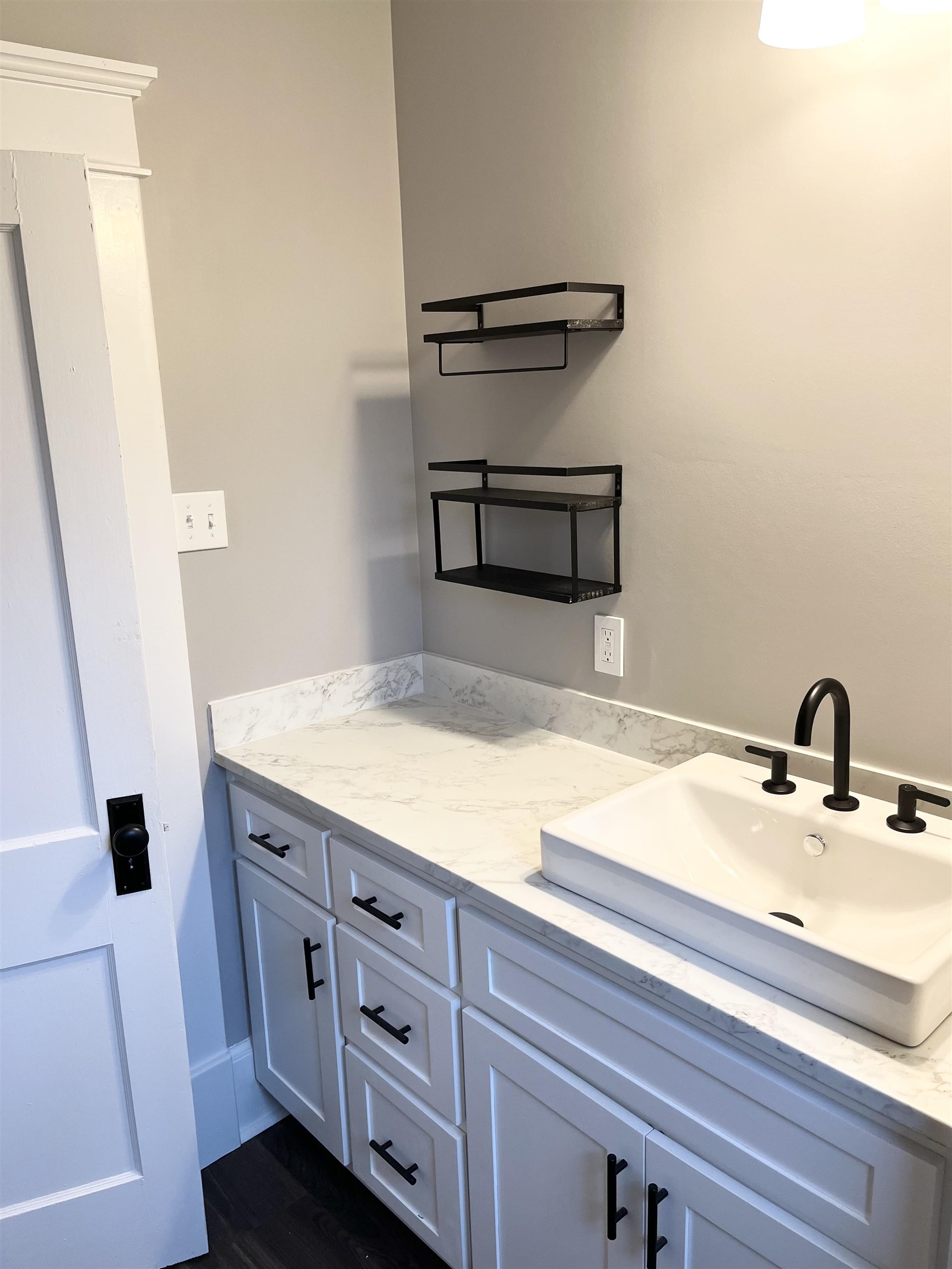 129 Wardlaw Circle Ripley, TN 38063 - Photo 17 of 24 a bathroom with a sink and a mirror