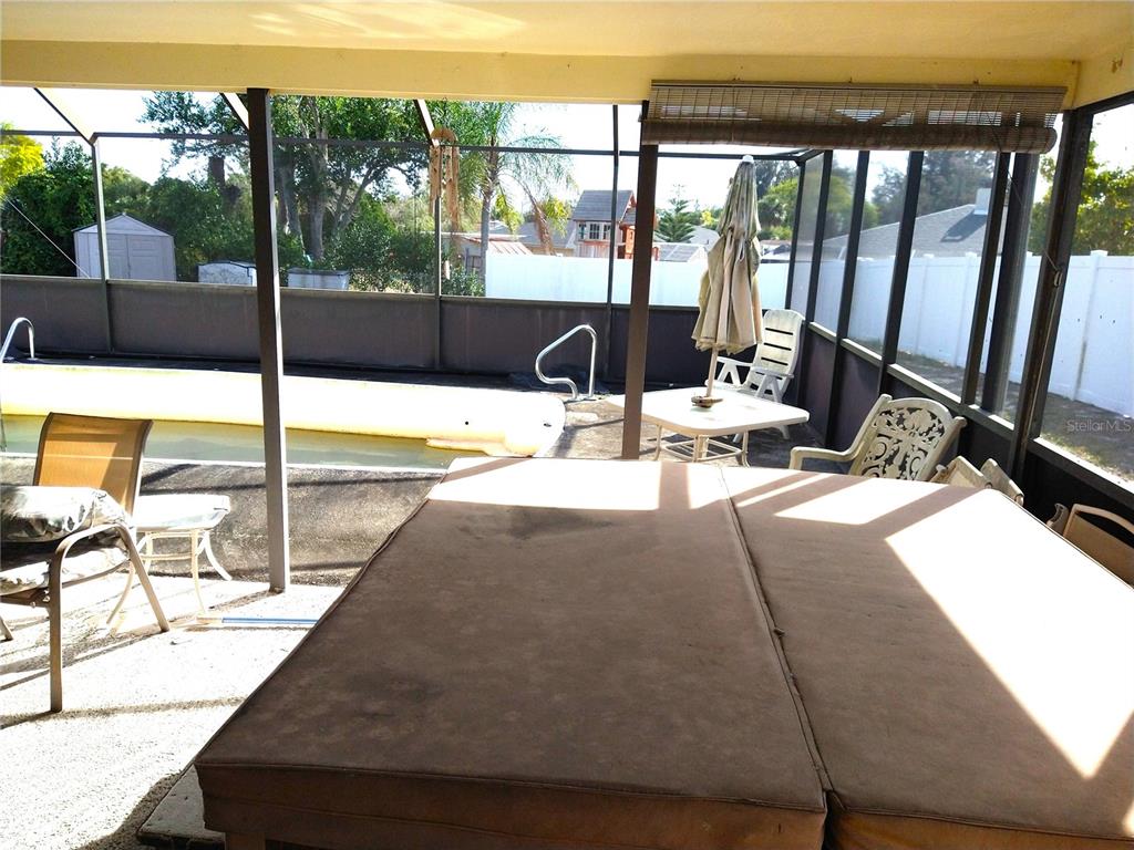 8415 Briarleaf Court Port Richey, FL 34668 - Photo 20 of 27 a view of swimming pool with a patio