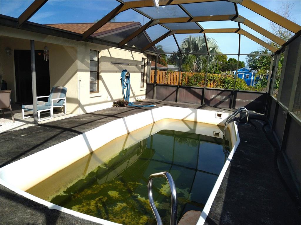 8415 Briarleaf Court Port Richey, FL 34668 - Photo 23 of 27 a view of swimming pool