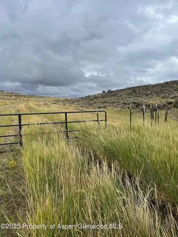 a view of a lake with a big yard