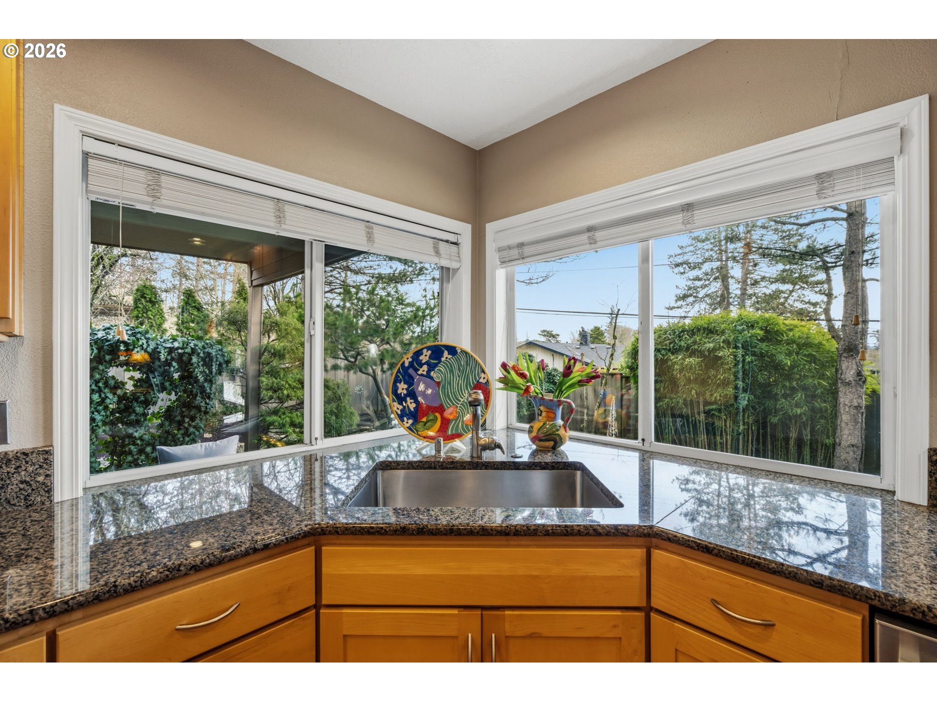 6108 Southwest Kruse Ridge Drive Portland, OR 97219 - Photo 11 of 42 a bathroom view with a garden space