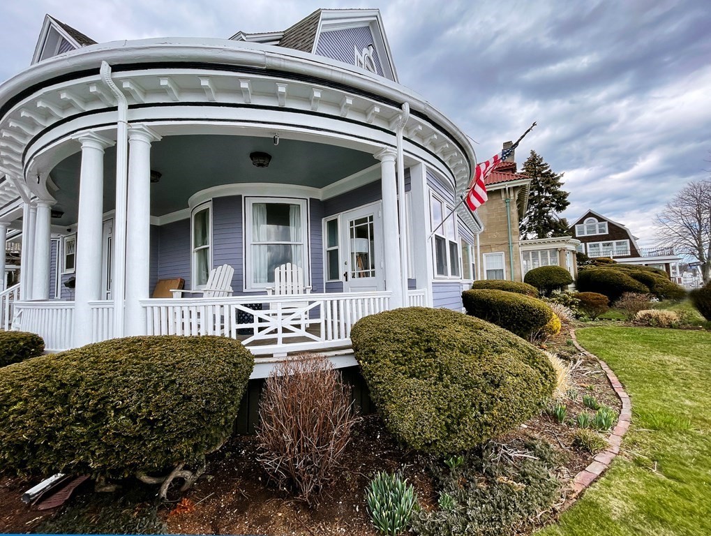 37 Lynn Shore Drive Lynn, MA 01902 - Photo 2 of 42 a front view of a house with garden