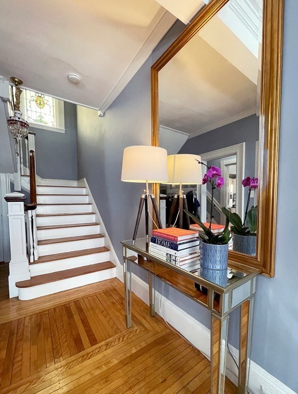 37 Lynn Shore Drive Lynn, MA 01902 - Photo 8 of 42 a room with lots of wooden furniture and a rug