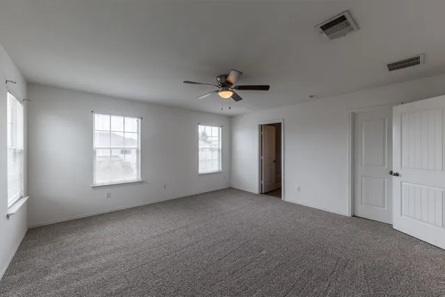 a view of an empty walk in closet