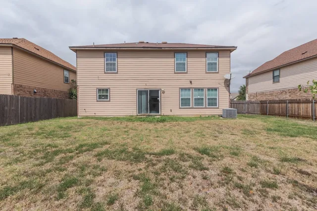 a house view with a outdoor space