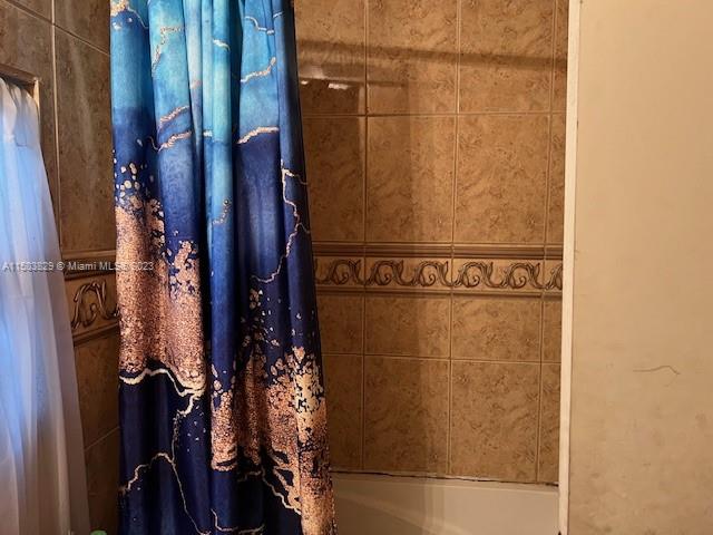 1755 Northwest 69th Street Miami, FL 33147 - Photo 22 of 36 a view of walk in closet