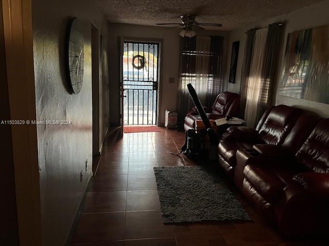 1755 Northwest 69th Street Miami, FL 33147 - Photo 25 of 36 a view of a hallway with wooden floor and windows