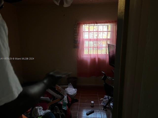 1755 Northwest 69th Street Miami, FL 33147 - Photo 28 of 36 a bathroom with a toilet