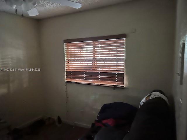 1755 Northwest 69th Street Miami, FL 33147 - Photo 29 of 36 a close up of a table in a room