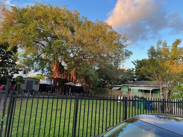 1755 Northwest 69th Street Miami, FL 33147 - Photo 35 of 36 a view of a house with a garden