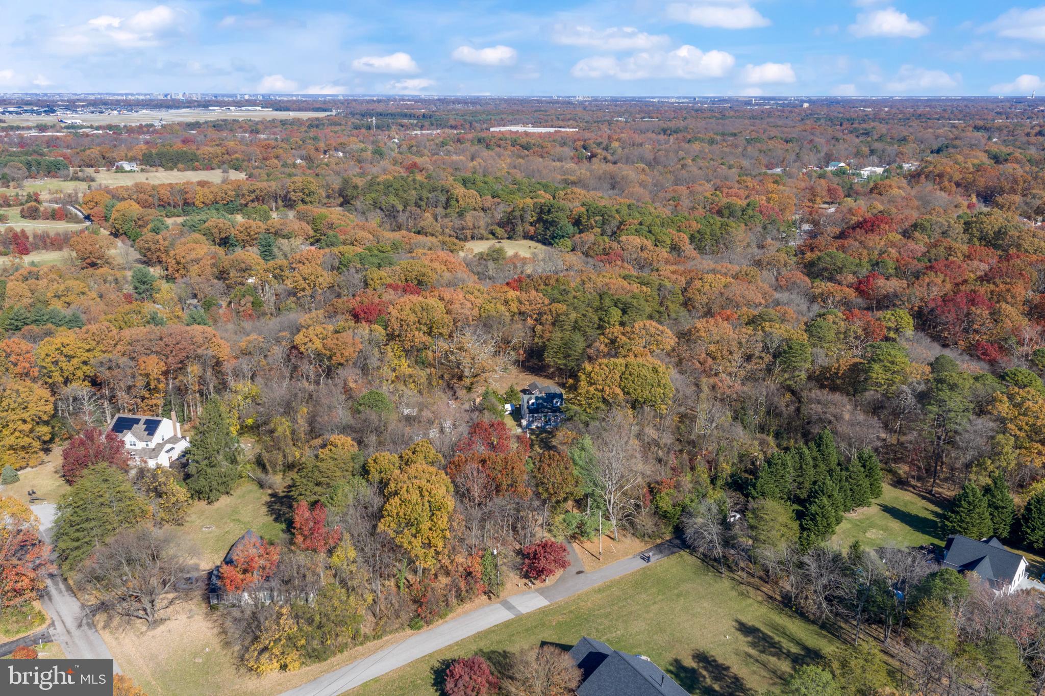 900 South Wieker Road Severn, MD 21144 - Photo 2 of 3 an aerial view of residential houses with outdoor space