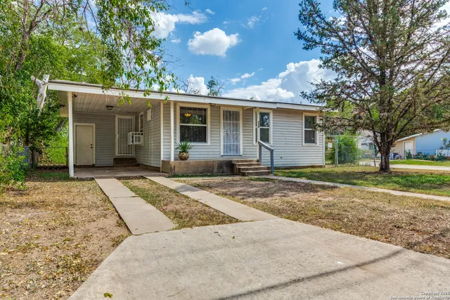 a view of a house with a patio