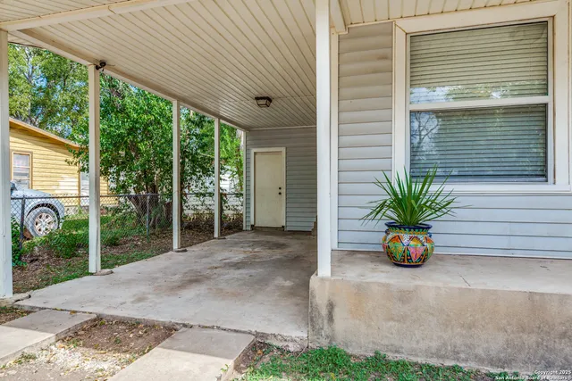 a view of a entryway door front of house