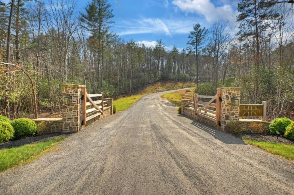 13 Rocky Ridge Mineral Bluff, GA 30559 - Photo 28 of 29 a view of a swimming pool with a patio and a yard
