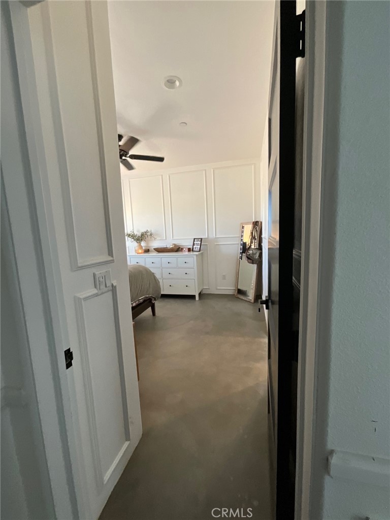 10773 Mills Road Apple Valley, CA 92308 - Photo 24 of 39 a view of living room and bedroom