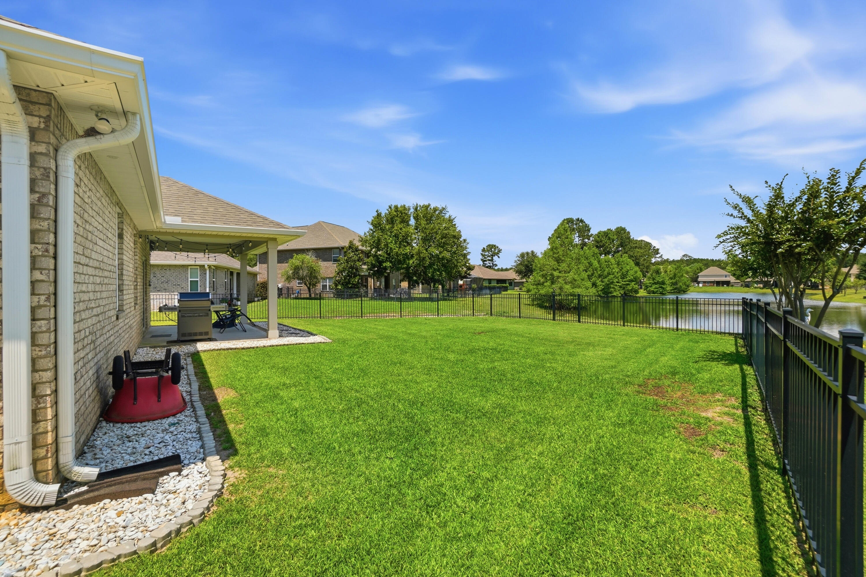 525 Windchime Way Freeport, FL 32439 - Photo 32 of 59 a view of a house with backyard
